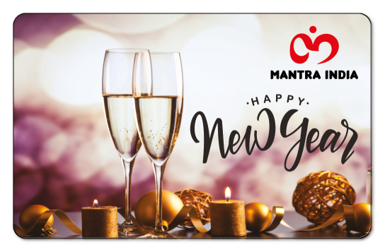 champagne glasses and candles on a background of lights with the mantra logo